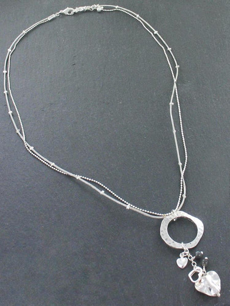 Beaten Ring Necklace With Heart Charms In Silver Plate
