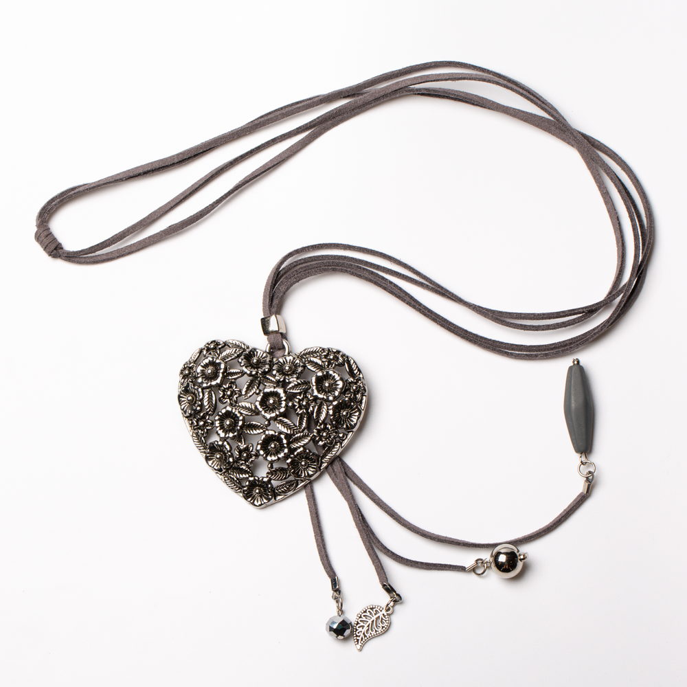 Long Carved Heart Pendant On Suede With Charms
