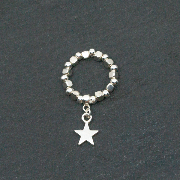 Elasticated Star Charm Ring In Silver Plate